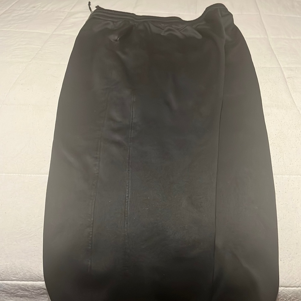 Black tech gear pants in a size large